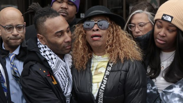 Nicole Banks breaks down after speaking briefly about the death of her son Dexter Reed during a news conference outside the 11th District police station in Chicago on April 24, 2024. A lawsuit was filed against the city and the police officers who fatally shot Reed during a traffic stop in Humboldt Park. (Antonio Perez/Chicago Tribune)