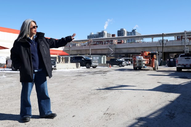 Ald. Leni Manaa-Hoppenworth of the 48th ward stands at a CTA-owned parcel of land along Broadway Avenue between Bryn Mawr and Hollywood avenues on Feb. 18, 2025. She hopes this parcel of land can be part of a city green social housing initiative. (Antonio Perez/Chicago Tribune)