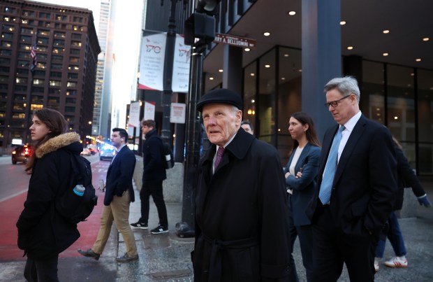 Former House Speaker Michael Madigan, center, leaves the Dirksen U.S. Courthouse in Chicago at the end of the day on Jan. 29, 2025, as his ongoing corruption trial continues. (Chris Sweda/Chicago Tribune)