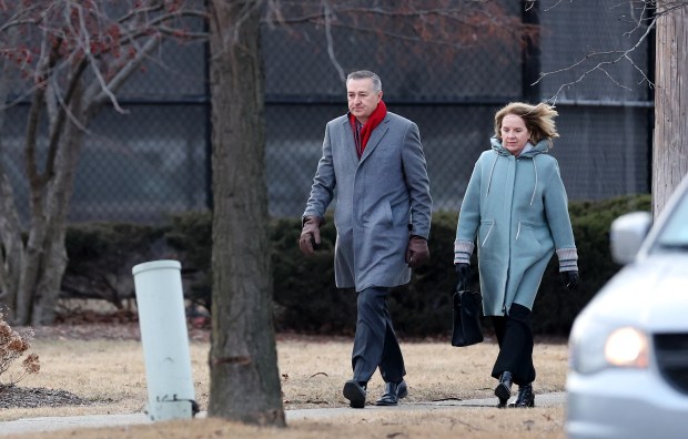 Tom Ricketts (cq) (left), chairman of the Chicago Cubs, arrives at Oehler Funeral Home in Des Plaines to attend the visitation for late Chicago Bears owner Virginia McCaskey on Tuesday, Feb. 11, 2025. The daughter of Bears team founder George Halas, McCaskey died on Feb. 6 at the age of 102. (Chris Sweda/Chicago Tribune)