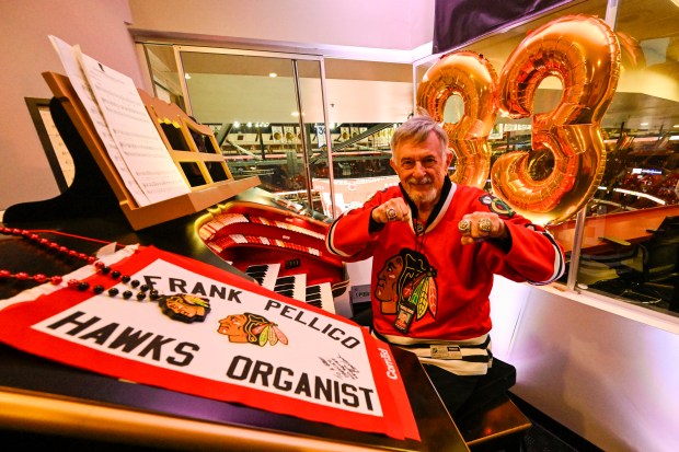 Frank Pellico, the Chicago Blackhawks' organist, is seen in his booth before the first period of an NHL hockey game against the Toronto Maple Leafs, Sunday, Feb. 23, 2025, in Chicago. He is retiring after the game. (AP Photo/Matt Marton)