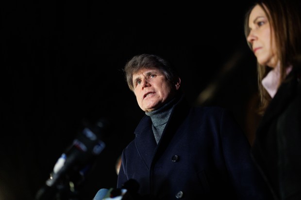 Former Illinois Gov. Rod Blagojevich and his wife Patti Blagojevich speak with members of the press outside their Ravenswood Manor home after he was granted a full pardon by President Donald Trump on Feb. 10, 2025. (Armando L. Sanchez/Chicago Tribune)