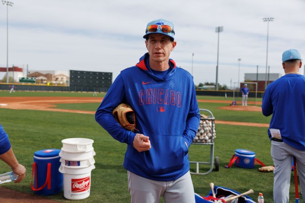 Cubs manager Craig Counsell walks on a practice field during spring training on Feb. 13, 2025, at Sloan Park in Mesa, Ariz. (Armando L. Sanchez/Chicago Tribune)