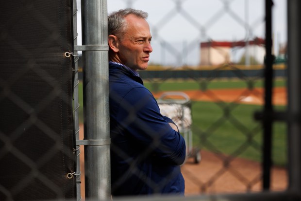 Cubs President Jed Hoyer stands on a practice field during spring training on Feb. 13, 2025, at Sloan Park in Mesa, Ariz. (Armando L. Sanchez/Chicago Tribune)