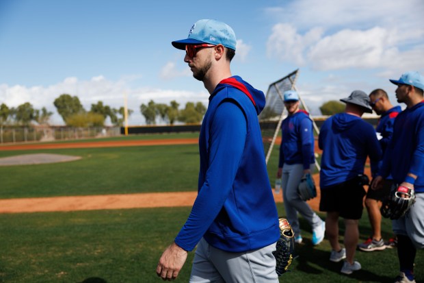 Chicago Cubs outfielder Kyle Tucker walks on the field after running drills with other players on the first day of full-squad workouts during spring training at Sloan Park Friday Feb. 14, 2025, in Mesa, Ariz. (Armando L. Sanchez/Chicago Tribune)