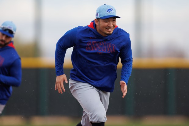 Cubs right fielder Seiya Suzuki runs the bases during practice on the first day of full-squad workouts during spring training at Sloan Park on Feb. 14, 2025, in Mesa, Ariz. (Armando L. Sanchez/Chicago Tribune)