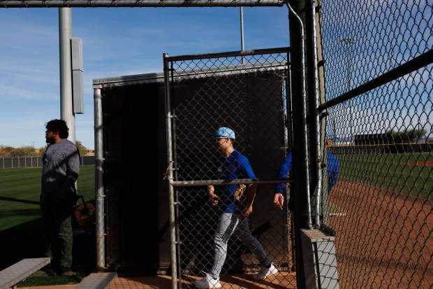 Chicago Cubs infielder Matt Shaw, center, leaves a practice field during spring training at Sloan Park Sunday Feb. 16, 2025, in Mesa, Ariz. (Armando L. Sanchez/Chicago Tribune)