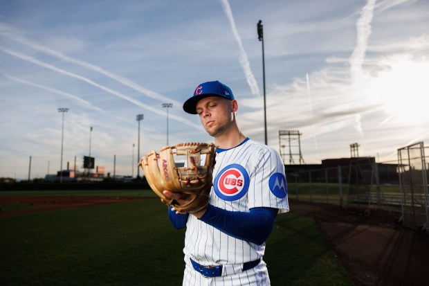 Chicago Cubs infielder Nico Hoerner with his glove at media day in Sloan Park, Feb. 17, 2025, in Mesa. (Armando L. Sanchez/Chicago Tribune)