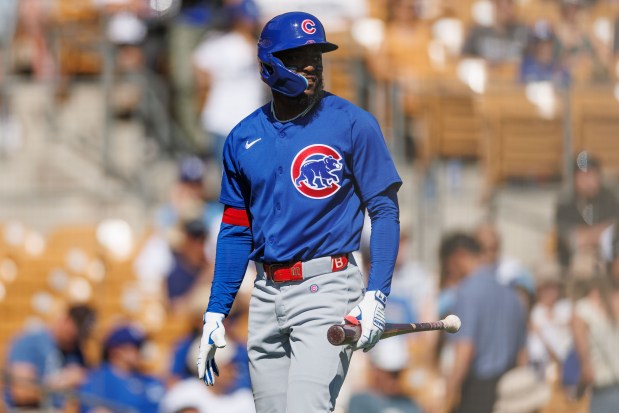 Chicago Cubs center fielder Vidal Bruján (17) walks to the dugout after striking out during the first inning against the Los Angeles Dodgers at spring training at Camelback Ranch Thursday Feb. 20, 2025, in Glendale, Arizona. (Armando L. Sanchez/Chicago Tribune)