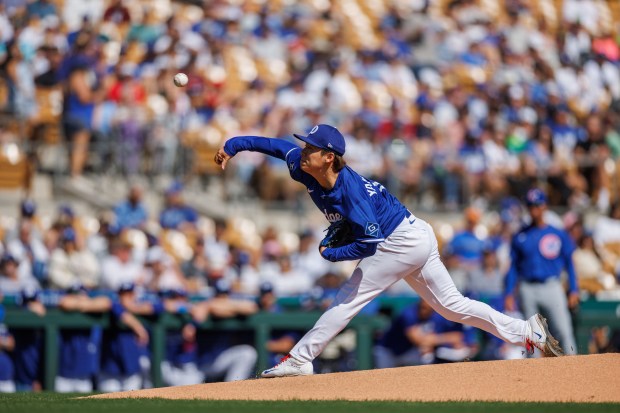 Los Angeles Dodgers pitcher Yoshinobu Yamamoto (18) pitches during the first inning against the Chicago Cubs at spring training at Camelback Ranch Thursday Feb. 20, 2025, in Glendale, Arizona. (Armando L. Sanchez/Chicago Tribune)