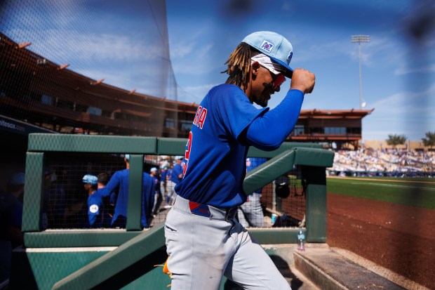 Chicago Cubs outfielder Kevin Alcántara (13) walks out of the dugout during the second inning against the Los Angeles Dodgers at spring training at Camelback Ranch Thursday Feb. 20, 2025, in Glendale, Arizona. (Armando L. Sanchez/Chicago Tribune)