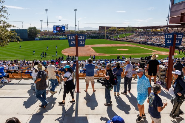 Fans walk through the concourse before the Cubs play the Dodgers in the Cactus League opener at Camelback Ranch on Feb. 20, 2025, in Glendale, Ariz. (Armando L. Sanchez/Chicago Tribune)