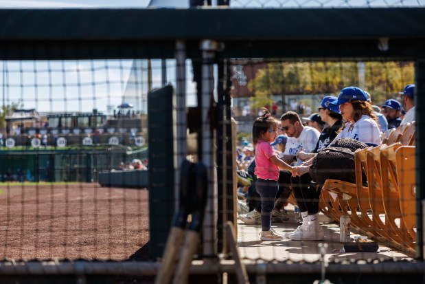 Fans sit in the stands while the Chicago Cubs play the Los Angeles Dodgers during the second inning at spring training at Camelback Ranch Thursday Feb. 20, 2025, in Glendale, Arizona. (Armando L. Sanchez/Chicago Tribune)