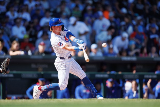 Cubs third baseman Benjamin Cowles hits an RBI double during the second inning against the White Sox on Feb. 22, 2025, at Sloan Park in Mesa, Ariz. (Armando L. Sanchez/Chicago Tribune)