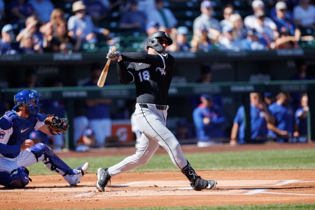 White Sox outfielder Mike Tauchman strikes out in the first inning against the Cubs during a Cactus League game at Sloan Park on Feb. 22, 2025, in Mesa, Ariz. (Armando L. Sanchez/Chicago Tribune)