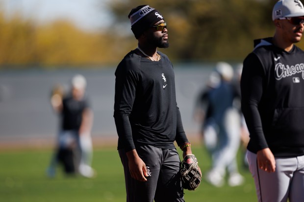 White Sox third baseman Bryan Ramos stands on a practice field with other players during spring training at Camelback Ranch on Feb. 15, 2025, in Glendale, Ariz. (Armando L. Sanchez/Chicago Tribune)