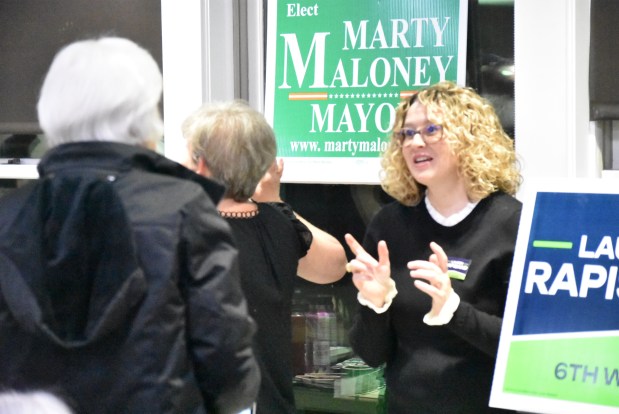 Lauren Rapisand, right, a candidate for 6th Ward alderman in Park Ridge, chats with attendees of a candidate forum Feb. 24, 2025 held in the O'Connor Community Building in Park Ridge. The Park Ridge Chamber of Commerce hosted the forum. (Jesse Wright/for Pioneer Press)