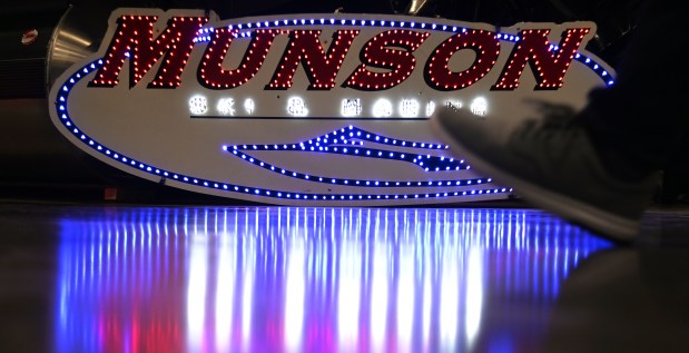 People walk by signage placed on the floor at the Northern Illinois Boat Show on opening day, Feb. 27, 2025 at the Lake County Fairgrounds (1060 E. Peterson Road) in Grayslake. (Karie Angell Luc/Lake County News-Sun)