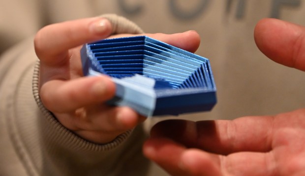 This is a 3D printed fidget toy made by vendors Ed Boyer and Ashley Sampier of Round Lake, partners with BSM 3D Prints of Round Lake. Taken at the Indoor Winter Ravinia Farmers Market on Feb. 15, 2025 in Highland Park at the Wayfarer Theaters. (Karie Angell Luc/Lake County News-Sun)