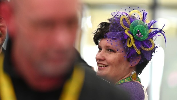 On right is Kari Miller of Grafton, Wisconsin at the Lake County Craft Beer Festival in Expo Hall at the Lake County Fairgrounds in Grayslake on Feb. 22, 2025. (Karie Angell Luc/Lake County News-Sun)