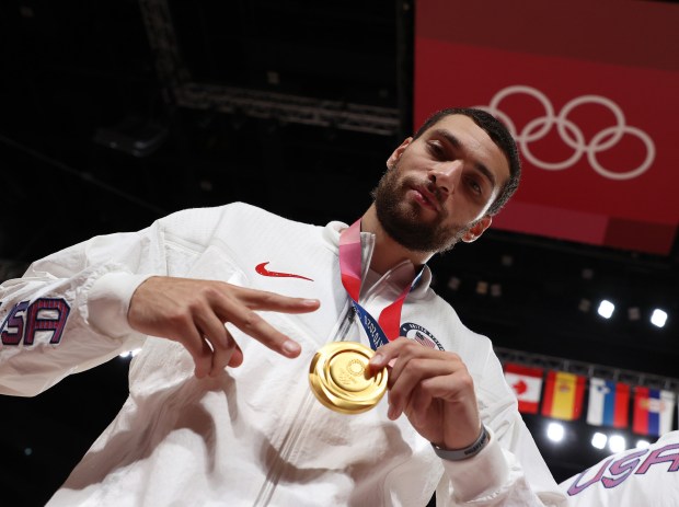 Zach LaVine poses with his gold medal at the Tokyo 2020 Olympics on Aug. 7, 2021, in Saitama, Japan. (Gregory Shamus/Getty Images)