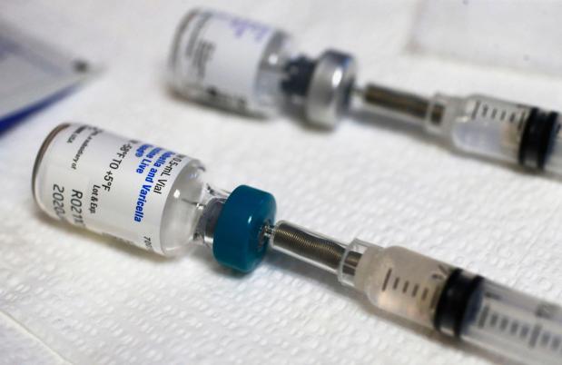 FILE - Measles and tetanus vaccine vials are ready to be administered at the Dallas County Health & Human Services immunization clinic in Dallas, on March 8, 2019. (Vernon Bryant/The Dallas Morning News via AP)