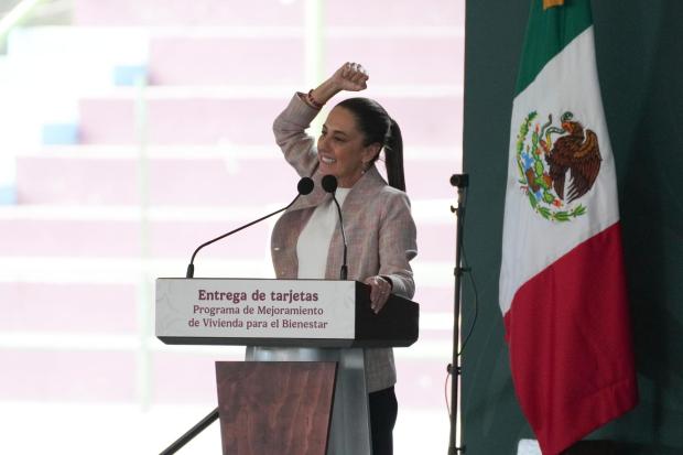 President Claudia Sheinbaum speaks at a Housing for Wellbeing event, a government-funded home improvement program, in Mexico City, Saturday, Feb. 1, 2025. (AP Photo/Marco Ugarte)