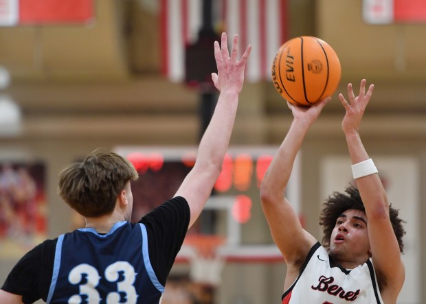 Benet's Jayden Wright shoots the ball