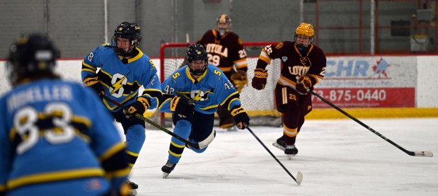 Varsity action on ice took place between Loyola Academy of Wilmette and the Glenbrook South High School Titans at Winterfest at the Glenview Community Ice Center on Feb. 1, 2025 in Glenview. (Karie Angell Luc/Pioneer Press)