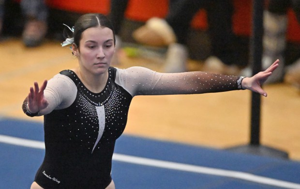 Lincoln-Way East's Alaina Lekki performing on the Floor Exercise during Friday's preliminary round of the IHSA State Meet at Palatine High School, Feb. 21, 2025. (Brian O'Mahoney for the Chicago Tribune)