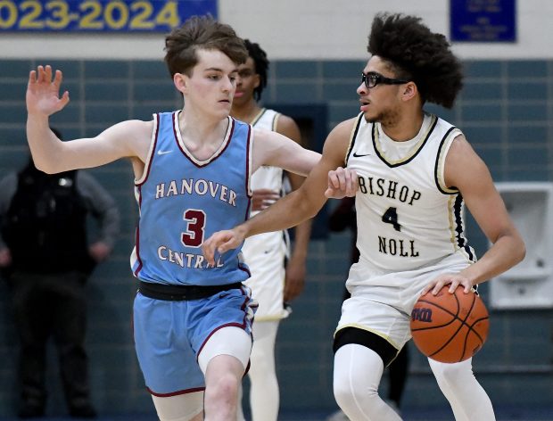 Bishop Noll's Isaiah Manley dribbles the ball