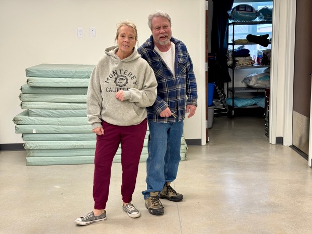 Mitch Peters and Lita Peters stand in the room at Daybreak that now offers emergency overnight shelter for homeless people in Valparaiso. The room's floor has radiant heat. (Doug Ross/Post-Tribune)