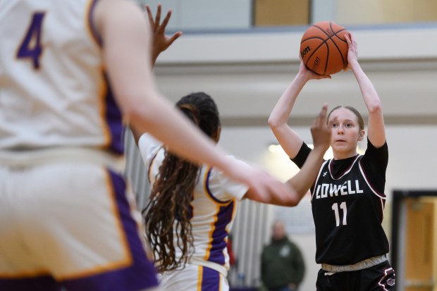 Lowell's Brooke Dawson looks to pass the ball