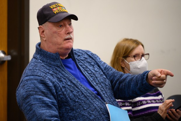 Portage resident Bob Stickley asks a question during a public town hall meeting hosted by State Sen. Rodney Pol Jr., D-Chesterton and State Rep. Chuck Moseley, D-Portage, on Saturday, Feb. 22, 2025 at Portage City Hall. (Kyle Telechan/for the Post-Tribune)