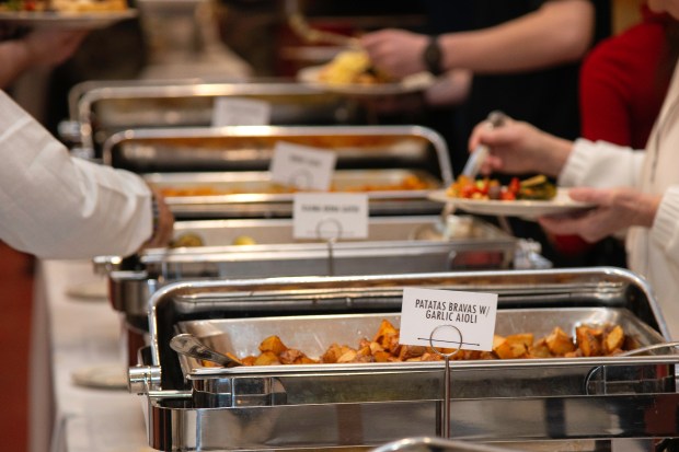 A variety of foods from around the globe are served during the Valparaiso International Student Association's 45th annual World Banquet at Valparaiso University on Saturday, Feb. 8, 2025. (Michael Gard/for the Post-Tribune)