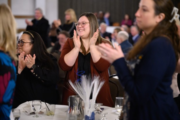 Visitors applaud during the Boys and Girls Club of Northwest Indiana's annual Youth of the Year program in Merrillville on Thursday, Feb. 27, 2024. (Kyle Telechan/for the Post-Tribune)