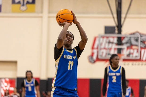 Bloom Township's Demetrius Boswell (11) shoots a free throw against Rich Township during a Southland Athletic Conference game in Richton Park on Tuesday, Feb. 18, 2025. (Vincent D. Johnson / for the Daily Southtown)