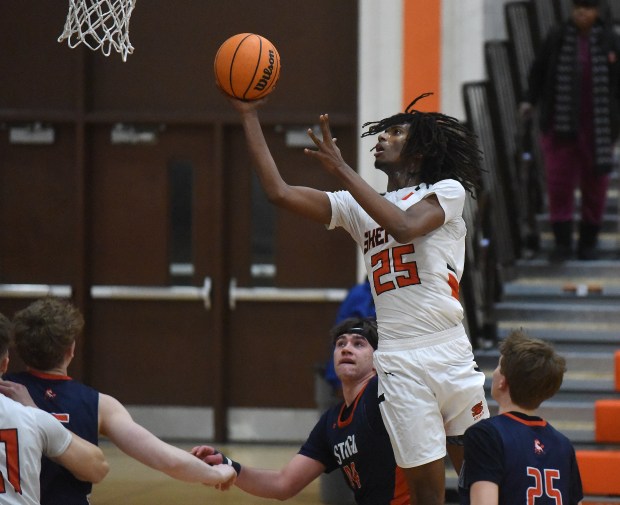 Shepard's Amari Williams (25) drives the lane against Stagg during the Class 4A Romeoville Regional quarterfinal Monday, Feb. 24, 2025 in Palos Heights, IL. (Steve Johnston/for the Daily Southtown)