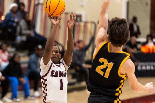 Southland Prep's David Shaw (1) puts up a shot as Reed-Custer's Alex Bielfeldt (21) comes in late on a block in the Class 2A Coal City Regional quarterfinal in Richton Park on Monday, Feb. 24, 2025. (Vincent D. Johnson / for the Daily Southtown)