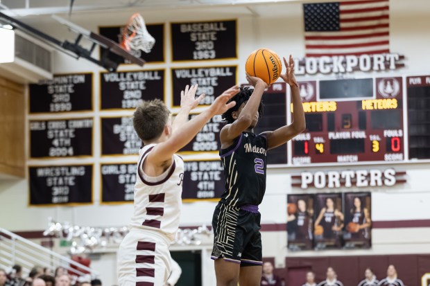 TF North's Dereon Smothers (7) shoots the ball against Lockport during a non-conference game in Lockport on Friday, Feb. 21, 2025. (Troy Stolt / for the Daily Southtown)