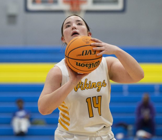 St. Laurence's Reaghan Galvin (14) shoots a foul shot during a game against De La Salle on Tuesday, Feb. 18, 2025, at De La Salle Institute in Chicago, Ill. (Vincent Alban/for The Chicago Tribune)