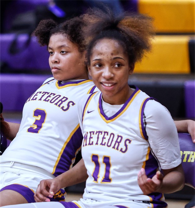 T.F. North's Kamariyah McClinton (3) and Natalie McGhee (11) relax at halftime during the Class 3A T.F. North Regional semifinals against Tinley Park on Monday, Feb.17, 2025 (John Smierciak / Daily Southtown)