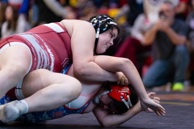 Lockport's Rebekah Ramirez works to turn Fenton's Ariana Solideo during their HWT final at the IHSA Girls Wrestling Schaumburg Sectional at Schaumburg High School on Saturday, Feb. 15, 2025 in Schaumburg, Illinois. ( John Konstantaras-Daily Southtown ) STA-L-GWR-SCHAUM-SECT-0217 ....7170-7179-250-51100-88888-76063