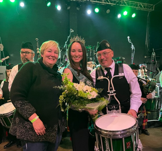 Grace McKee, with her parents Carol and Dave, is queen for the 2025 South Side Irish St. Patrick's Day Parade. (South Side Irish St. Patrick's Day Parade and Heritage Foundation)