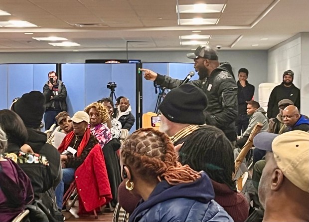 Community activist Jedidiah Brown points toward Thornton Township Supervisor Tiffany Henyard at a Township Board meeting Jan. 28, 2025. Following Brown's comments, a brawl broke out at the meeting. (Olivia Stevens/Daily Southtown)