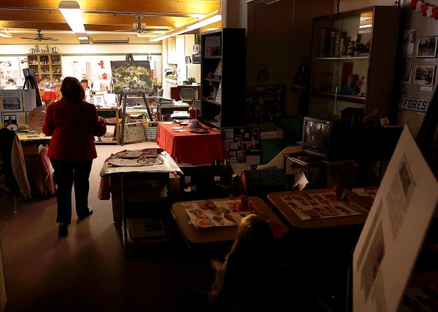 Jane Nicoll, museum director, walks through the Park Forest 1950s House Museum and archive which is housed at St. Mary Church's school. The Museum, located inside the former classrooms, is facing an uncertain future with the potential closure by the Joliet Diocese. The museum and historical archive is shown here on Friday, Feb.7, 2025 (John Smierciak / Daily Southtown)