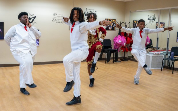 Senior Jeremiah Smith, from left, and juniors Jadyn Erves, Trevor Branch and Ricky Larkin prepare for what is billed as the country's biggest non-Greek middle school and high school step show. The Feb. 15 Kappa League Step Show is at Southland College Prep Charter High School in Richton Park. (Eric Lites)