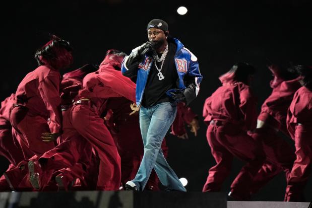 Kendrick Lamar performs during halftime of the Super Bowl between the Kansas City Chiefs and the Philadelphia Eagles, Sunday, Feb. 9, 2025, in New Orleans. (AP Photo/Frank Franklin II)