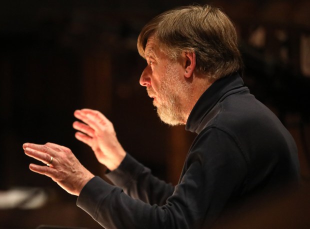 Music Director Sir Andrew Davis works Sept. 20, 2016 during rehearsal for "Das Rheingold" at the Lyric Opera. (Brian Cassella/Chicago Tribune)