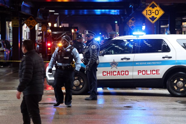 Chicago police investigate after two Innovations High School students were fatally shot on Wabash Avenue between Madison and Washington streets on Jan. 26, 2024. (Terrence Antonio James/Chicago Tribune)